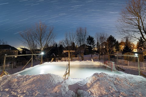Photo by Star trails on the backyard  rink